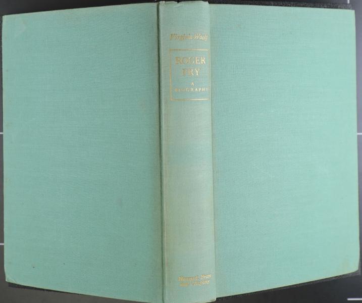 Pale green cloth boards with gold lettering along spine.