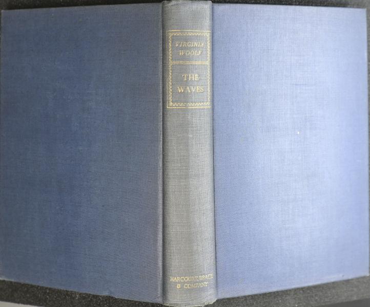 Full cover; dull blue cloth boards with gold lettering on spine